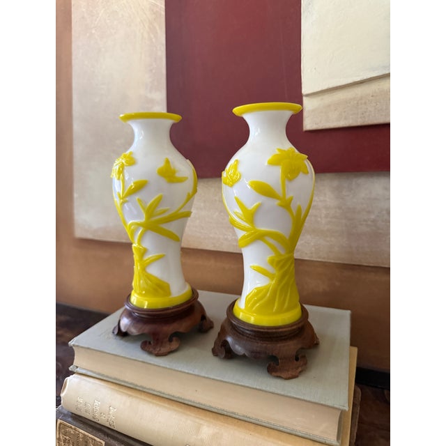 Pair of Mid-Century Peking Glass Vases With Carved Yellow Floral and Butterfly Motif | Chinese Overlay Glass on Wood Stands For Sale - Image 4 of 10