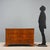 Austro-Hungarian Empire walnut chest of drawers from the early 20th century, featuring a classic and refined design. The...