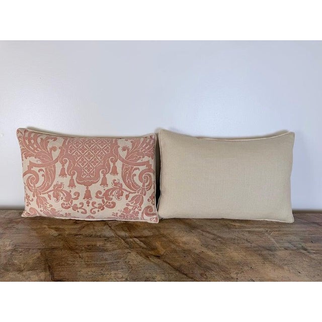 A distinguished pair of bespoke lumbar pillows, executed in a refined printed cotton and distinguished by a large-scale...