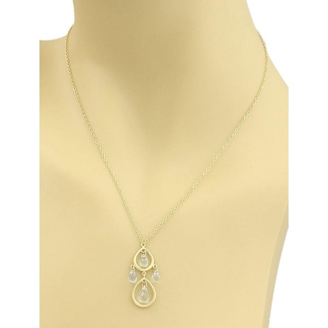 The Tiffany & Co. Aquamarine 18k Gold 2 Teardrop Pendant Necklace is a stunning piece of fine jewelry. It features a...
