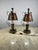 Pair of Italian brutalist -style table lamps, 60s. Made mainly using iron and copper, they best represent the typical...