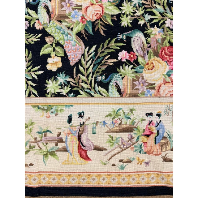 A beautifully detailed large needlepoint Aubusson-style rug featuring an elegant allover peacock and floral pattern set...