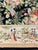 A beautifully detailed large needlepoint Aubusson-style rug featuring an elegant allover peacock and floral pattern set...