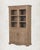 Warm wood. Clear glass. A cornice that carries quiet authority. This antique Indian Armoire has the proportions of...