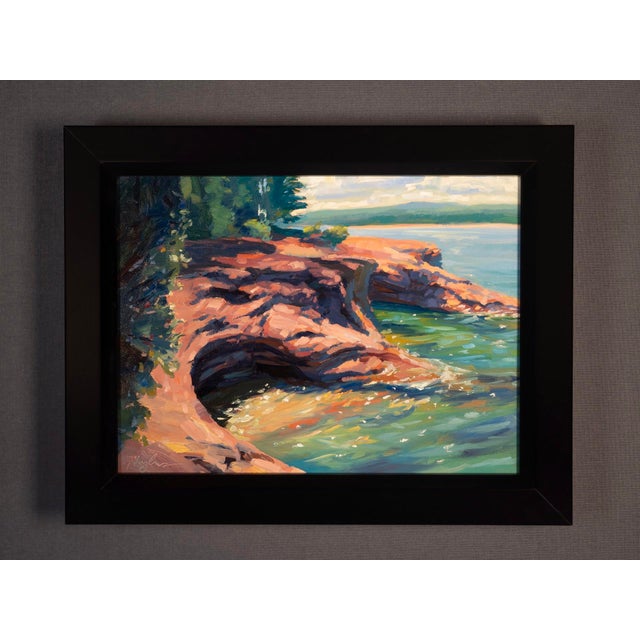 This oil painting captures the rugged beauty of Presque Isle, emphasizing the vibrant interplay of light and shadow on the...