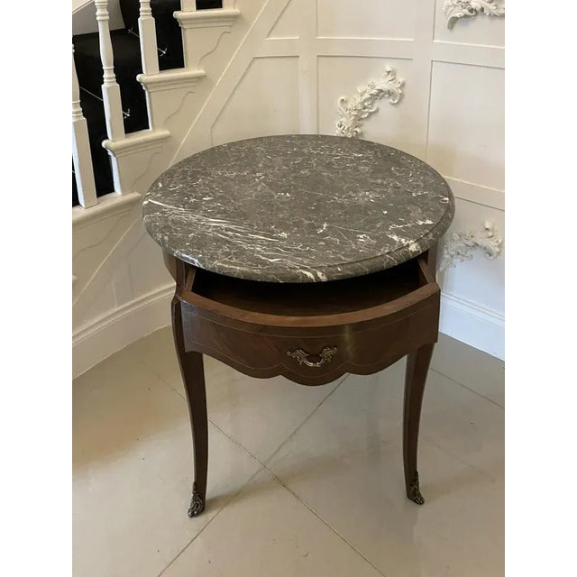 Antique victorian quality kingwood centre table having a lovely circular marble table with a moulded edge above a shaped...