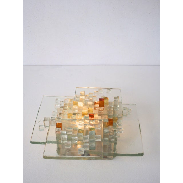 Italian wall lamp designed by Albano Poli for Poliarte in Murano glass. Brutalist sconce lamp featuring a geometric,...