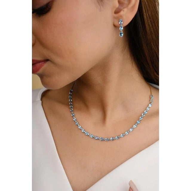 This is part of Chairish’s Fine Jewelry assortment. Natural Blue Topaz Gemstone Necklace and Earrings Jewelry Set Crafted...