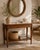 Elegant vintage French Louis XVI style console table crafted from rich mahogany and featuring a beautiful inset white...