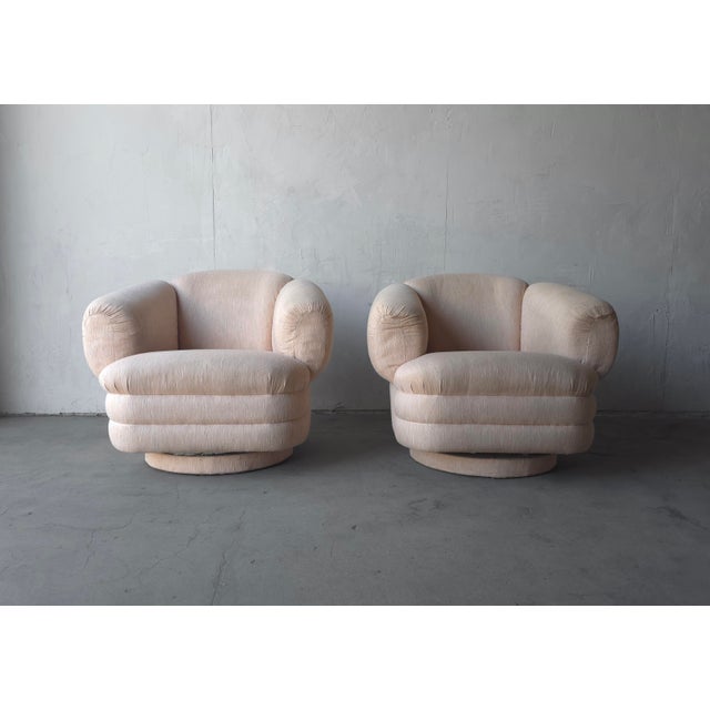 This is a large scale pair of all original Post Modern swivel chairs by Directional are the ultimate statement pair of...