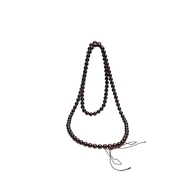 Handcrafted from solid wood, this 108-bead mala is a beautiful and meaningful accessory for meditation, yoga, or everyday...