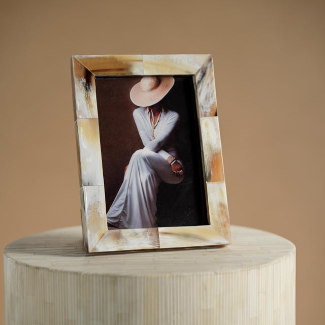 This stunning picture frame offers a unique, elegant way to showcase treasured photos of your loved ones. This beautiful...