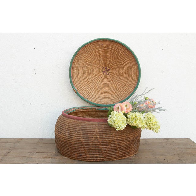 At a substantial 30 inches wide, this lidded storage basket is a masterpiece of functional nomadic craftsmanship. Baskets...