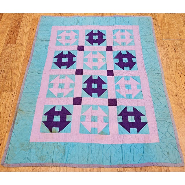 43” x 55” Beautifully hand-crafted American Amish pieced cotton quilt in a “Churn Dash” pattern from Lancaster County,...