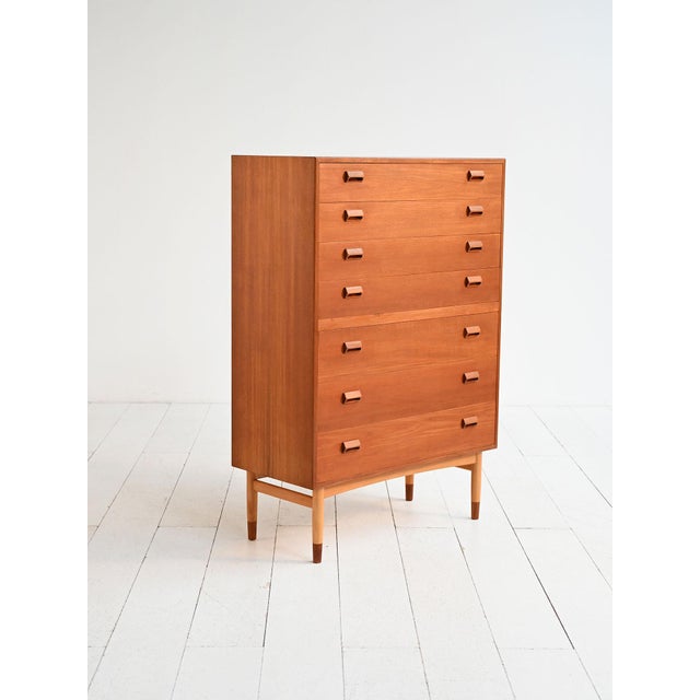 Chest of drawers produced by Søborg Møbelfabrik in the 1950s, designed by Børge Mogensen. Teak veneered frame with oak...