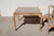 A five-piece Chippendale-style game set, a square game table and four matching side chairs, made by a Southern California...