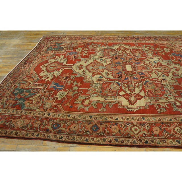 Antique Serapi Persian Knotted Rug, Circa Date: 1880s. This exceptional example of a Serapi weaving represents the height...