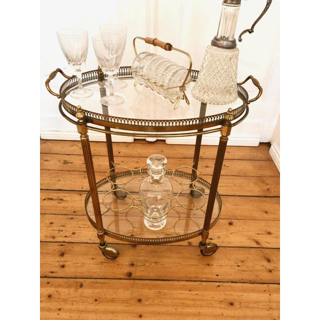 Vintage French Brass Tea Trolley with Removable Tray and 8-Tier Bottle Holder, 1950s, in Very Good conditions. Designed...