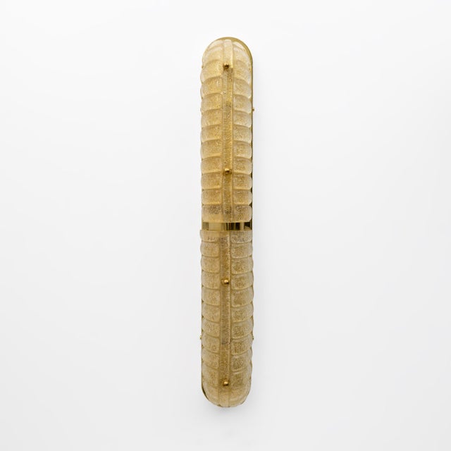 Pair of Art Deco inspired Murano glass and brass flush mount wall lights with a timeless yet elegant aesthetic. Perfect...