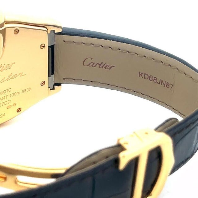 This is a fabulous authentic men's wristwatch by Cartier from the Roadster Collection. The case is crafted from 18k yellow...