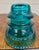 This is a gorgeous aqua or teal vintage glass Hemingray insulator. “Hemingray-42”. Has a piece chipped off, as pictured....