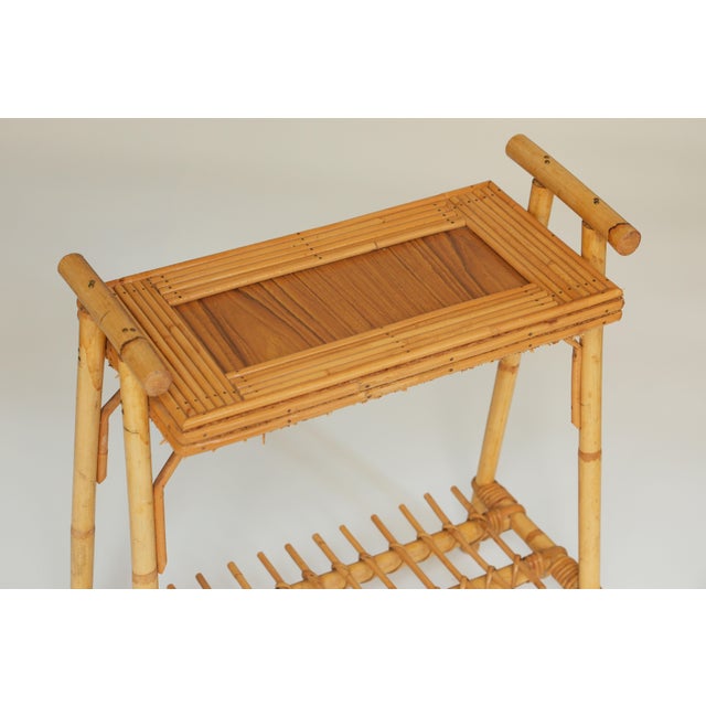 Elegant and highly decorative mid-century Italian side table attributed to Vivai del Sud, crafted in natural rattan and...