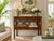 Elegant 1970s Hollywood Regency Chinoiserie-style two-tier nightstand or end table featuring richly figured burl wood...