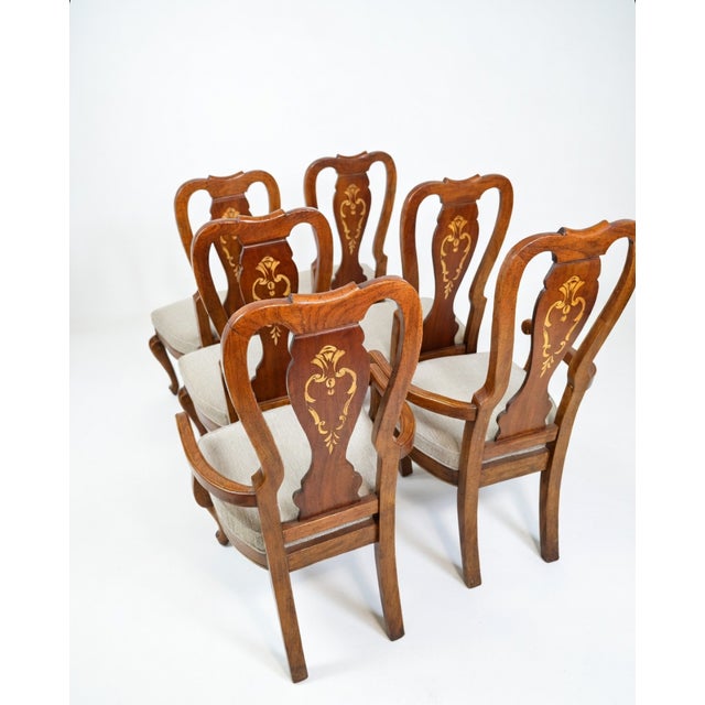 This elegant set of six vintage dining chairs brings timeless sophistication and classic French Provincial (Louis XV...