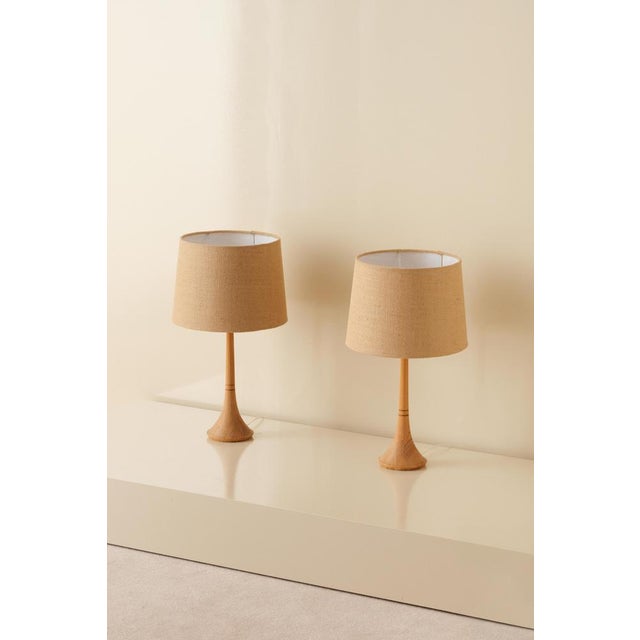 Swedish table lamps in pine produced during the 1970s. Good condition. Up to 250V (Europe/UK Standard).The wiring of this...