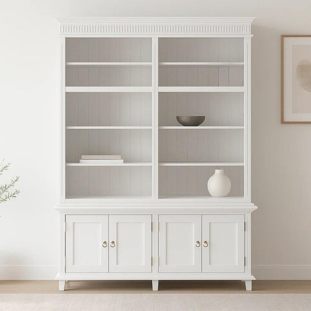 This versatile two piece hutch unit features a classic white finish, elegant legs, and silver chrome hardware,...