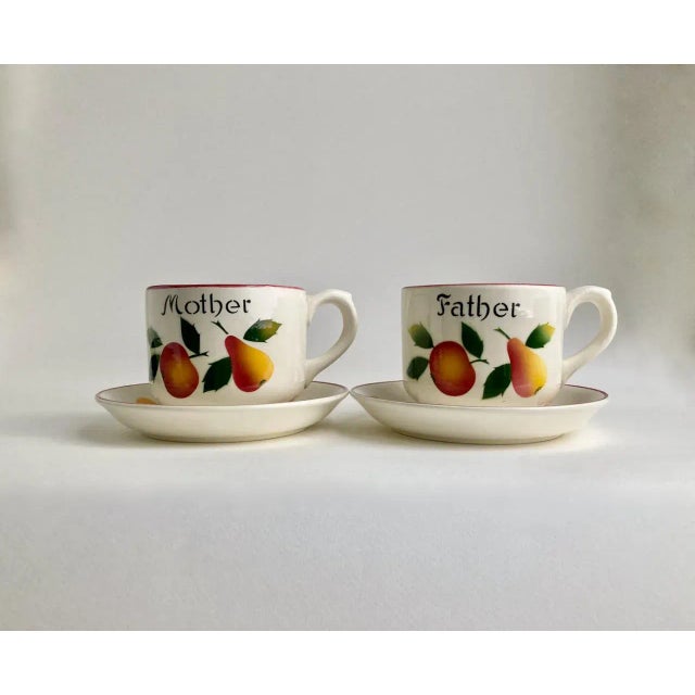 Larger pair of hand painted R.C.P. Co. European Mother & Father large handled Cups + Saucers. Featuring Cups and Saucers...