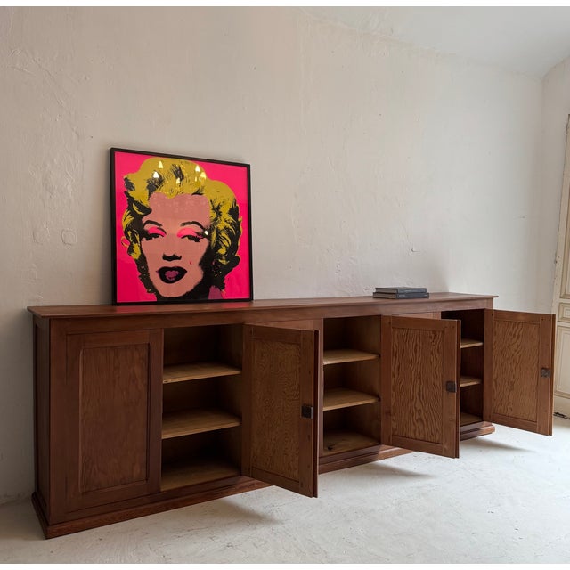 An exceptionally large sideboard from the first third of the 20th century. France/Belgium. A linear pine (pitch pine) body...