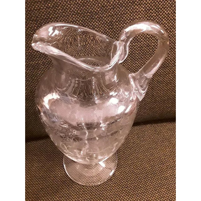 French Jug in Engraved Crystal Glass from Baccarat, 1970s, in Good conditions. Designed 1970 to 1979 This piece has an...