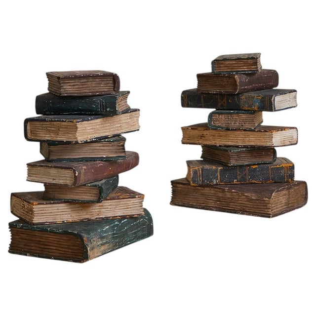 Sold and priced individually. A trompe-loeil of stacked books, this 1970s end table, attributed to American maker...