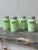 Vintage Jeanette Glass Jadeite Shakers, Set of Four, Circa 1950s. Molded, ribbed jadeite glass body with a screw on...