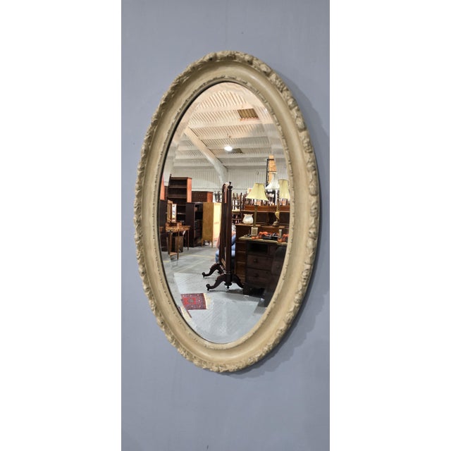 Very good Victorian oval painted mirror with deep bevelled plate glass, in overall great condition. 28" x 17"