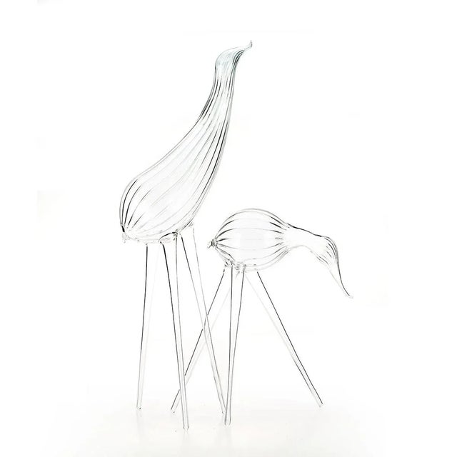 Transparent smooth and striped glass DoDo sculpture. Elegant and playful at the same time, the DoDo sculpture will enrich...