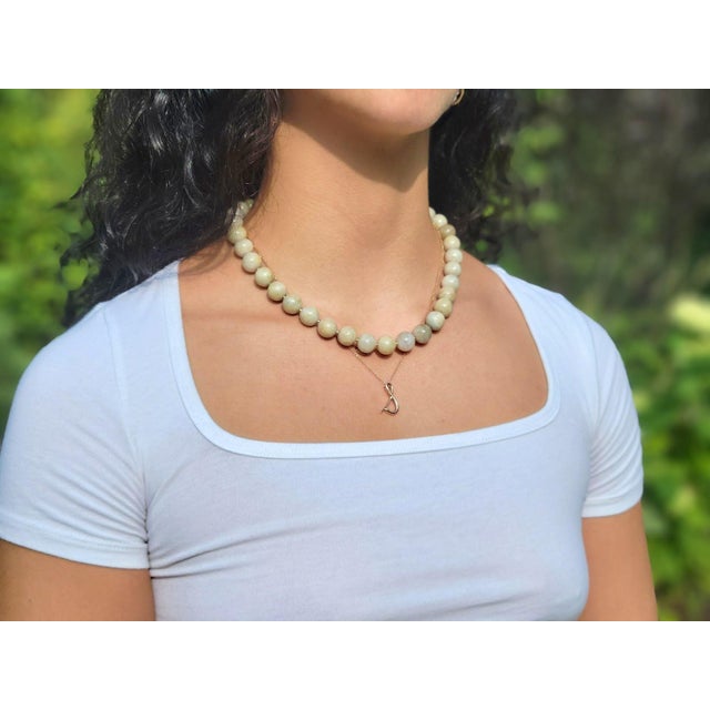 The jade beads on this necklace are undyed, untreated natural creamy honey tan jades of excellent quality. The jade beads...