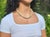We are pleased to present this elegant vintage necklace composed of beautifully matched natural jade beads in warm, creamy...