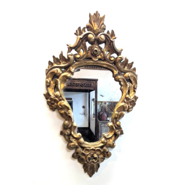 Matched pair of French Antique Baroque Carved Gilt Mirrors. Wonderful pair of French Baroque style carved gilded mirrors....