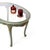 Lacquered coffee table. Louis XV Baroque Venetian style, lightblue with alabaster top and gilded carved leaves....