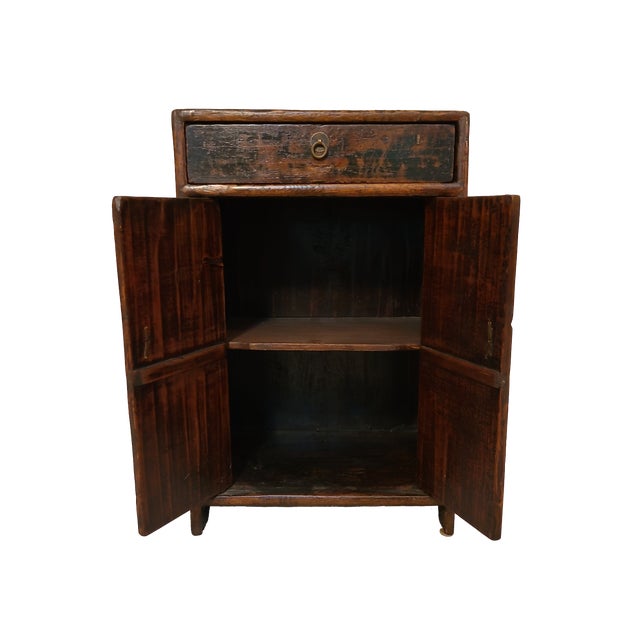 This is a wonderful antique cabinet with a heavy lacquered finish and beautiful faded design on front. This piece has...