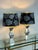 Design Plus Gallery presents a Pair of Geometric Silver Table Lamps. Each lamp has a sculptural stacked geometric base in...