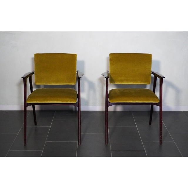 A beautiful pair of armchairs in the style of Franco Albini's Luisa chair. The seat has been restored with an oil-green...