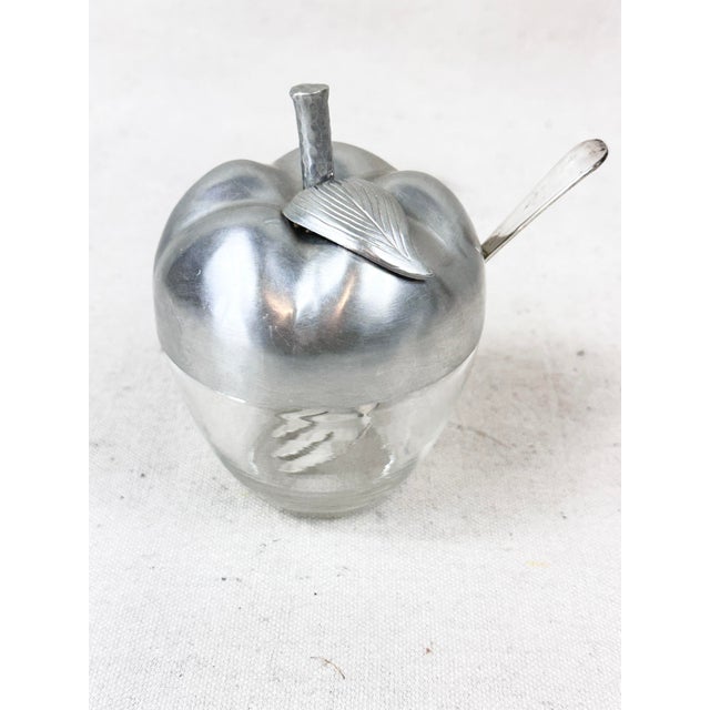 Add a touch of vintage charm to your table setting or bar cart with this delightful apple-shaped condiment jar. Combining...
