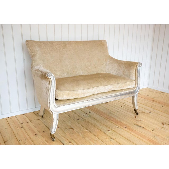 A beautiful, fine and uniquely reimagined french two-seater sofa of outstanding quality in lovely condition. This superb...