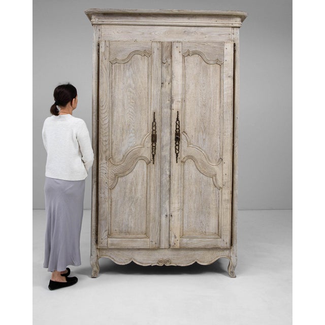 This cabinet carries genuine presence, its whitewashed weathered wood, two-door immediately setting the tone for the...