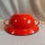 Latge scale orange-red handled enamel bowl perfect for farmhouse decor. This 1940's era bowl is 18.5" D plus 25" handles x...