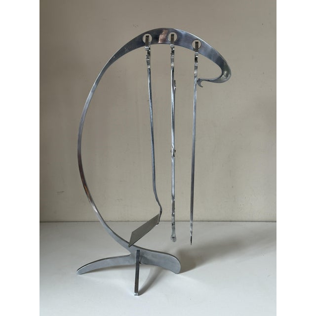 A very elegant 1970s fireplace tool set by Jean Paul Création, it is as attractive as it is practical, featuring three...