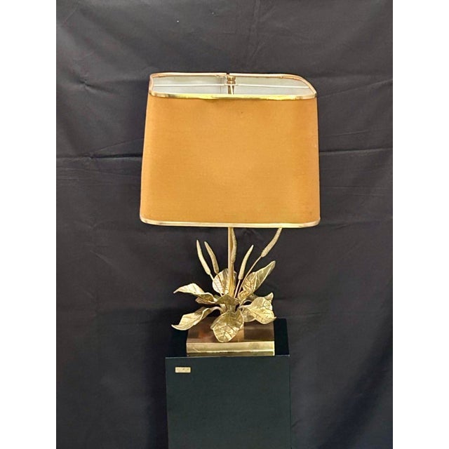 Beautiful bronze and brass lamp by Form Luminaires, a manufacturer of bronze lamps. This model is the "Plantin Lamp."...